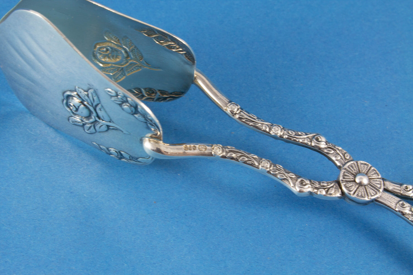 Wonderful silver pastry tongs from the Reiner brothers with a fine floral pattern