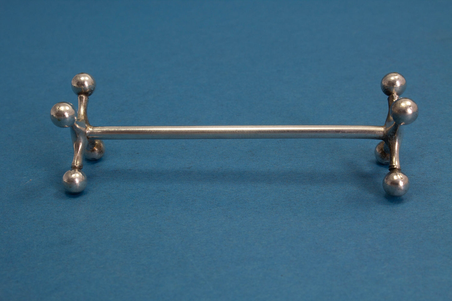 6 versilberte Messerbänkchen