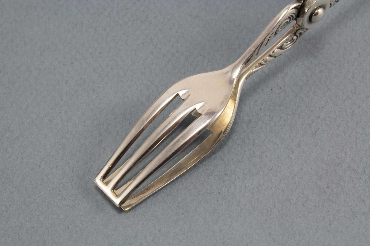 Kleine Gebäckzange, Röllchenzange, versilbert - Löffelland