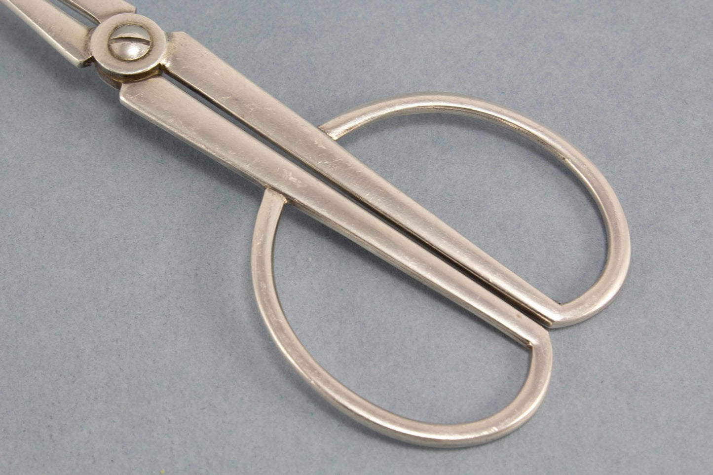 Versilberte Gebäckzange, Art Deco - Löffelland