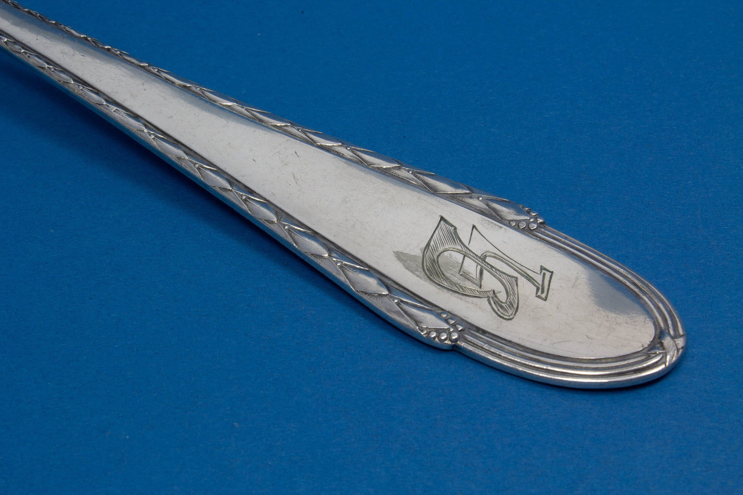 Silver plated soup trowel , engraved