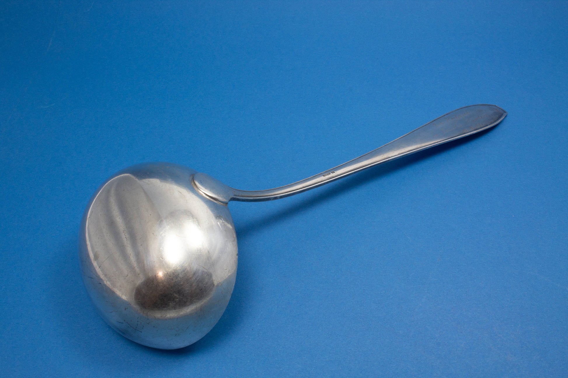 Silver plated soup trowel , engraved