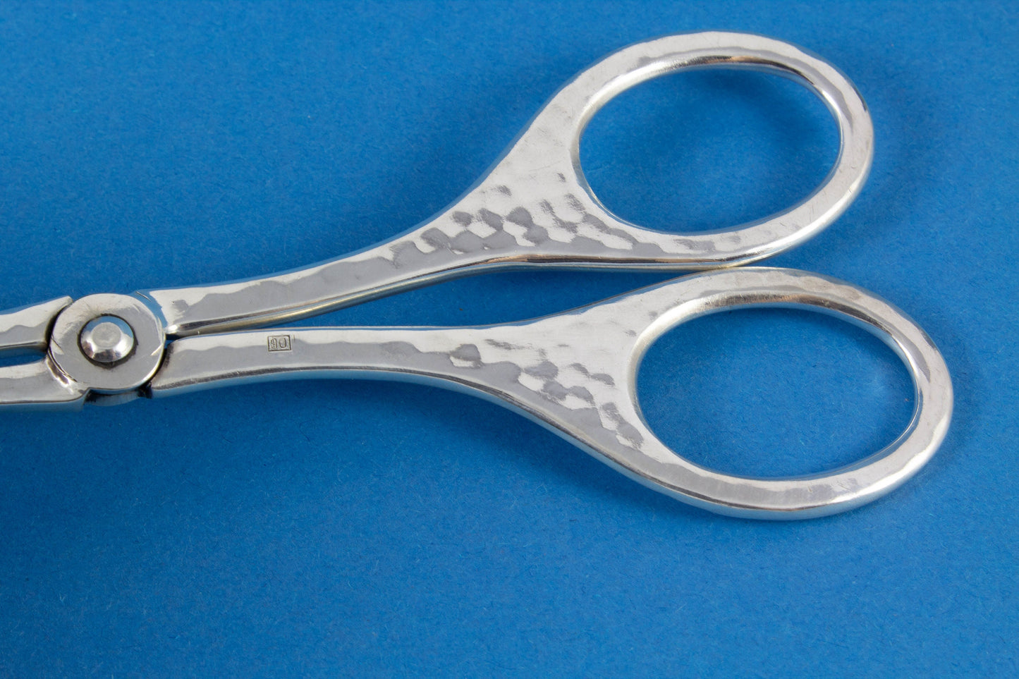 Big silver-plated pastry pliers, hammered pattern