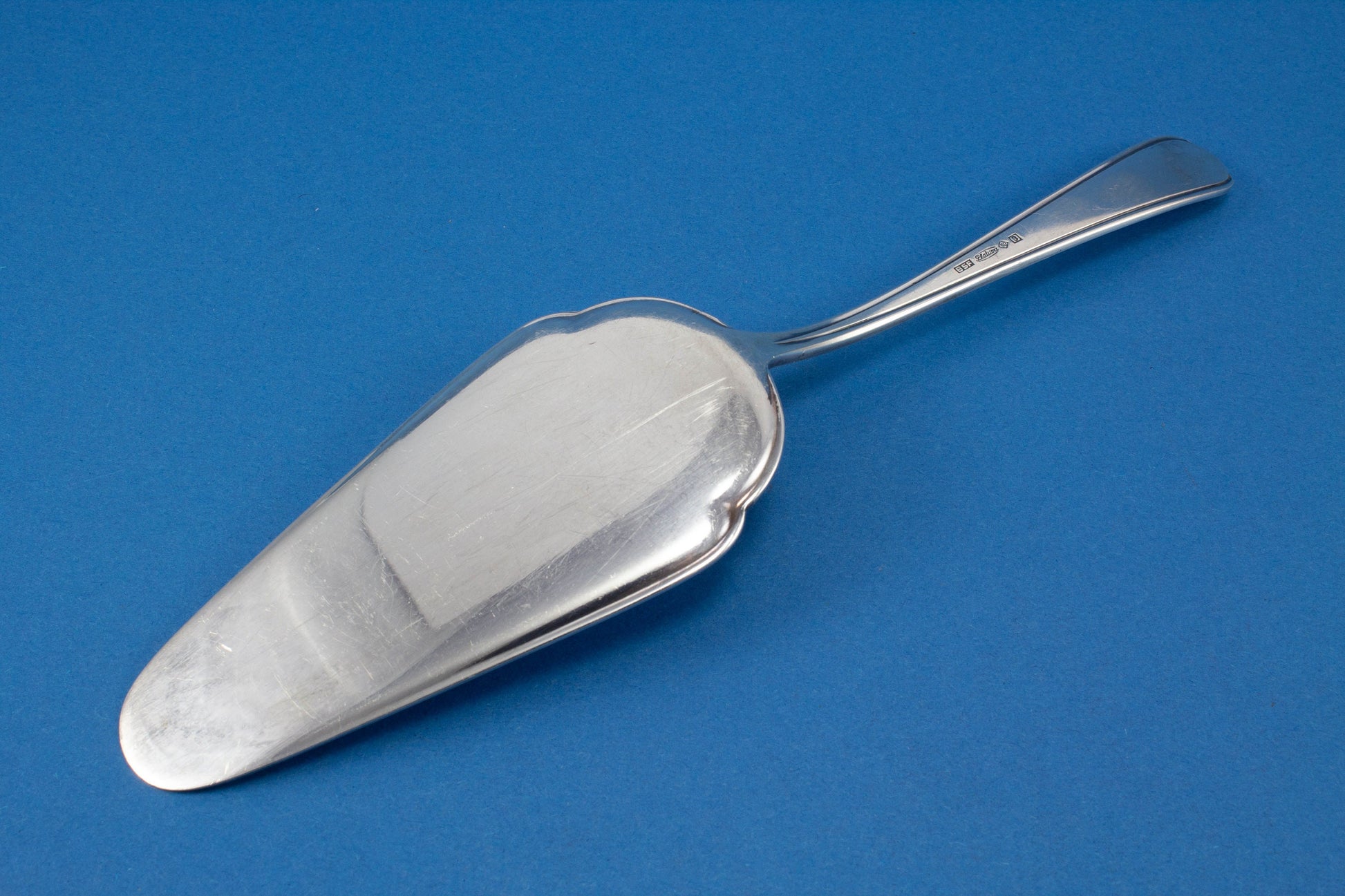 Silver-plated cake server with sugar tongs and sugar spoon from Wellner