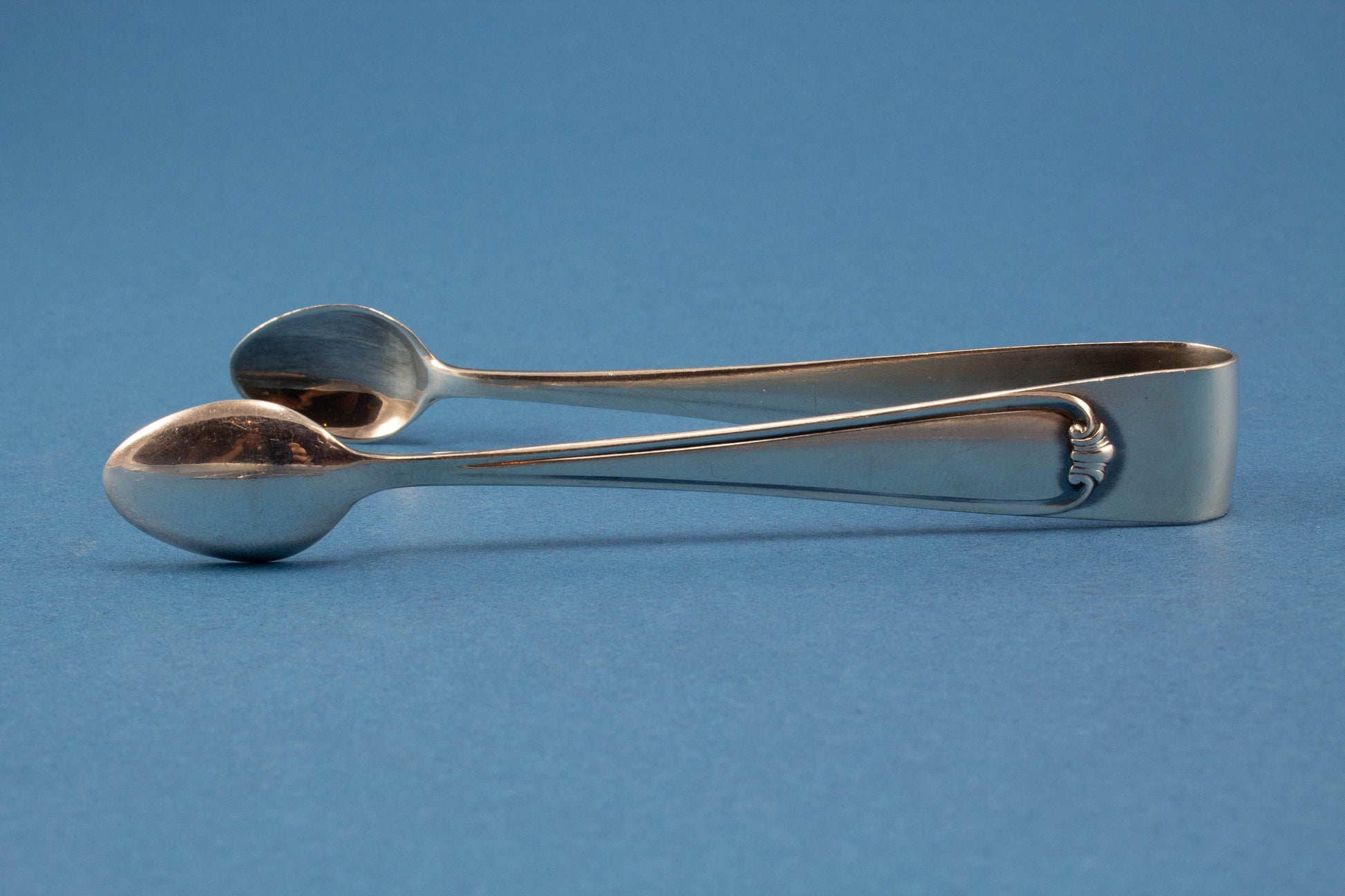 Silver-plated cake server with sugar tongs and sugar spoon from Wellner