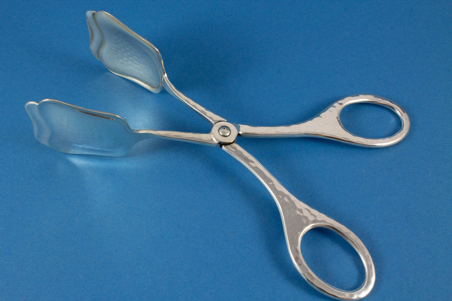 Big silver-plated pastry pliers, hammered pattern