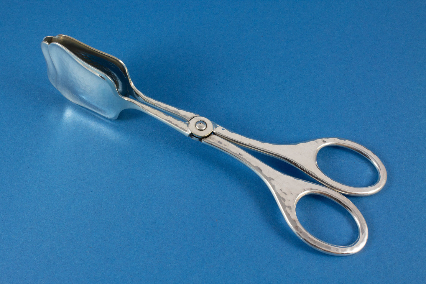 Big silver-plated pastry pliers, hammered pattern