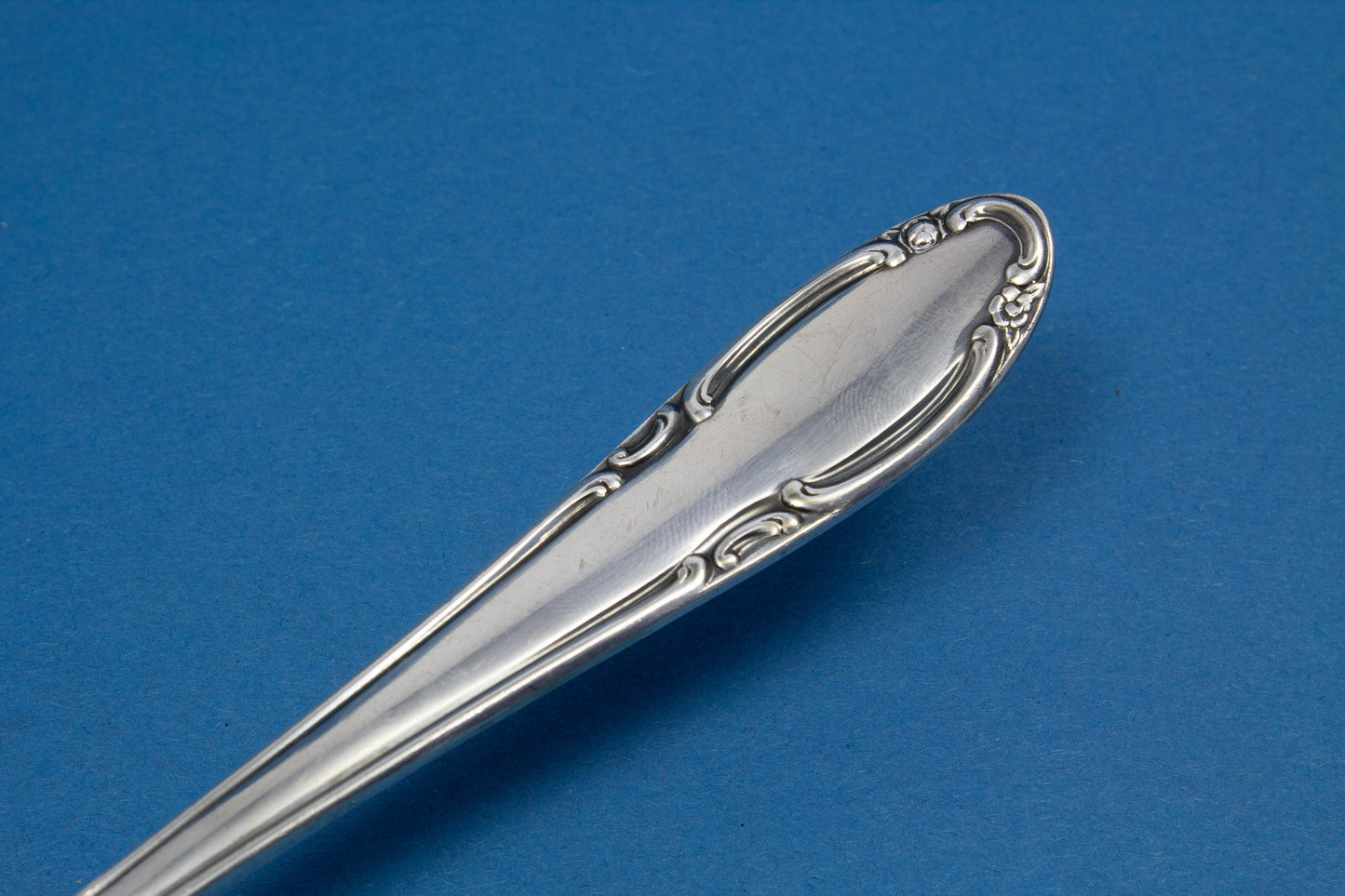 Silver-plated cake server with roses