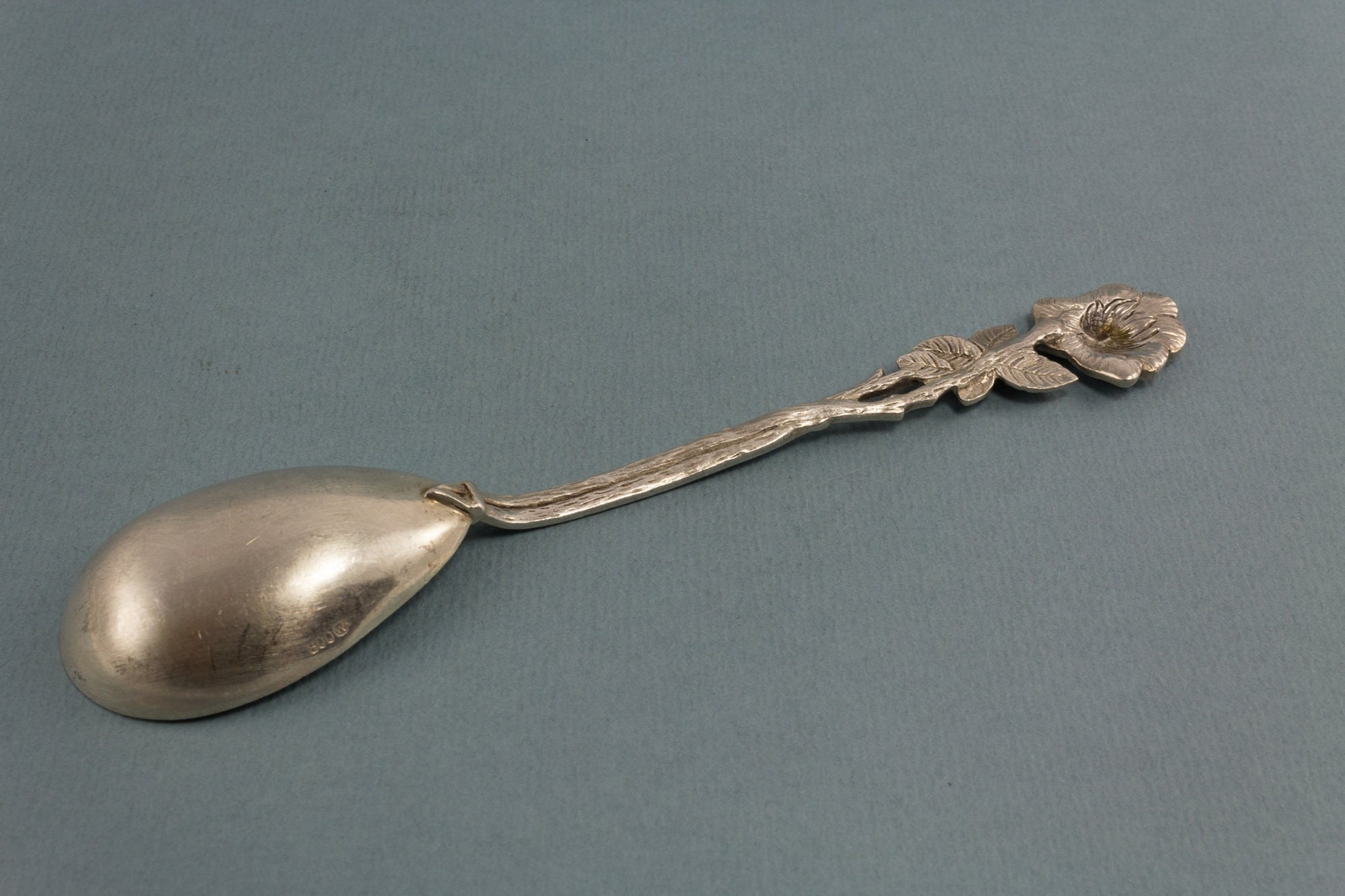 Silver sugar spoon with roses, 800 silver