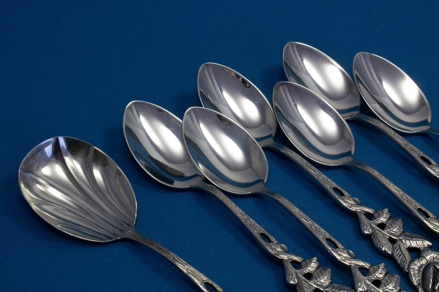 6 small mocha spoons with a matching sugar spoon