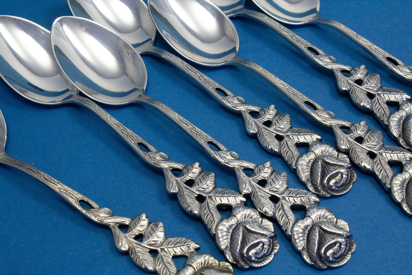 6 small mocha spoons with a matching sugar spoon