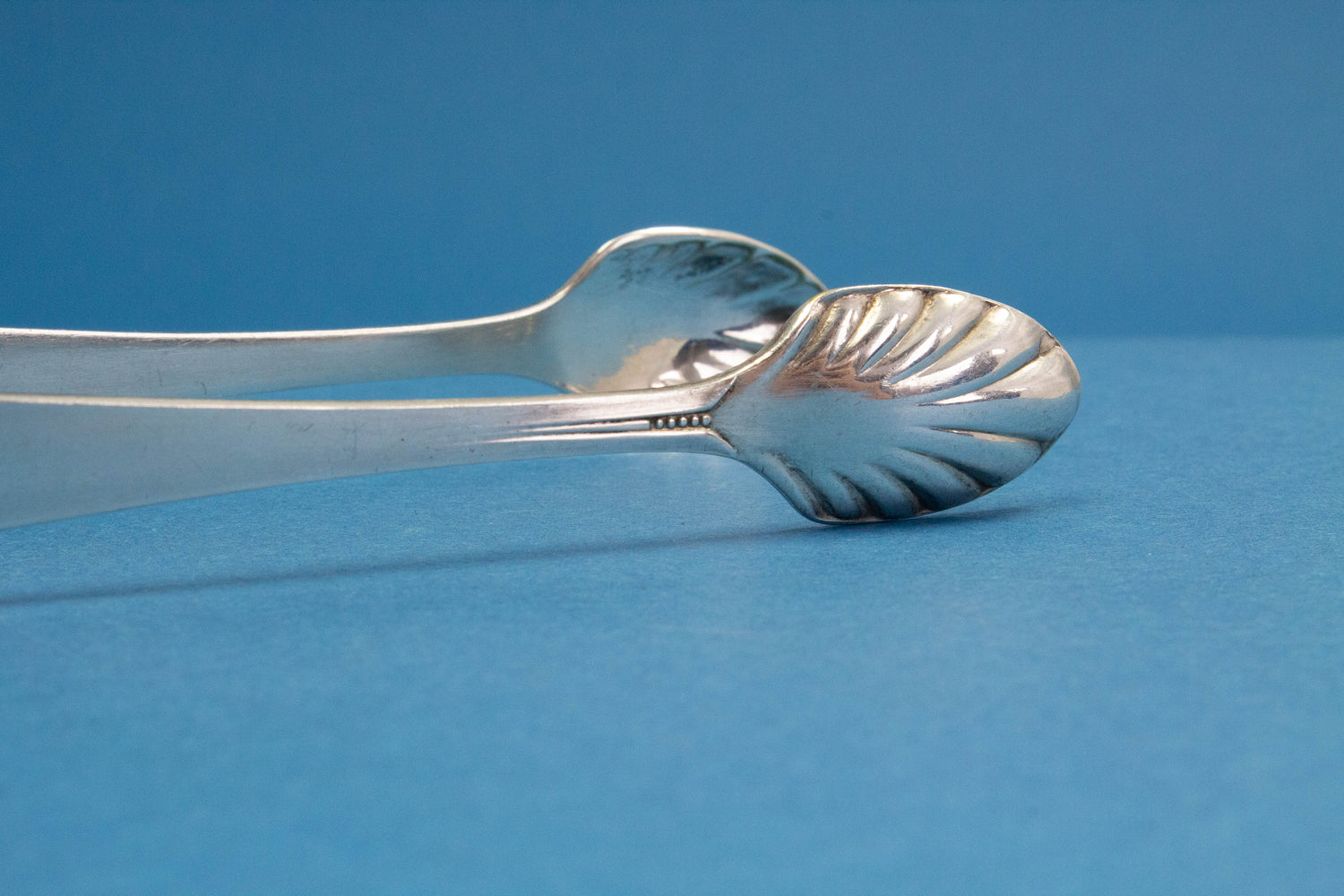 Silver plated sugar tongs with art nouveau pattern